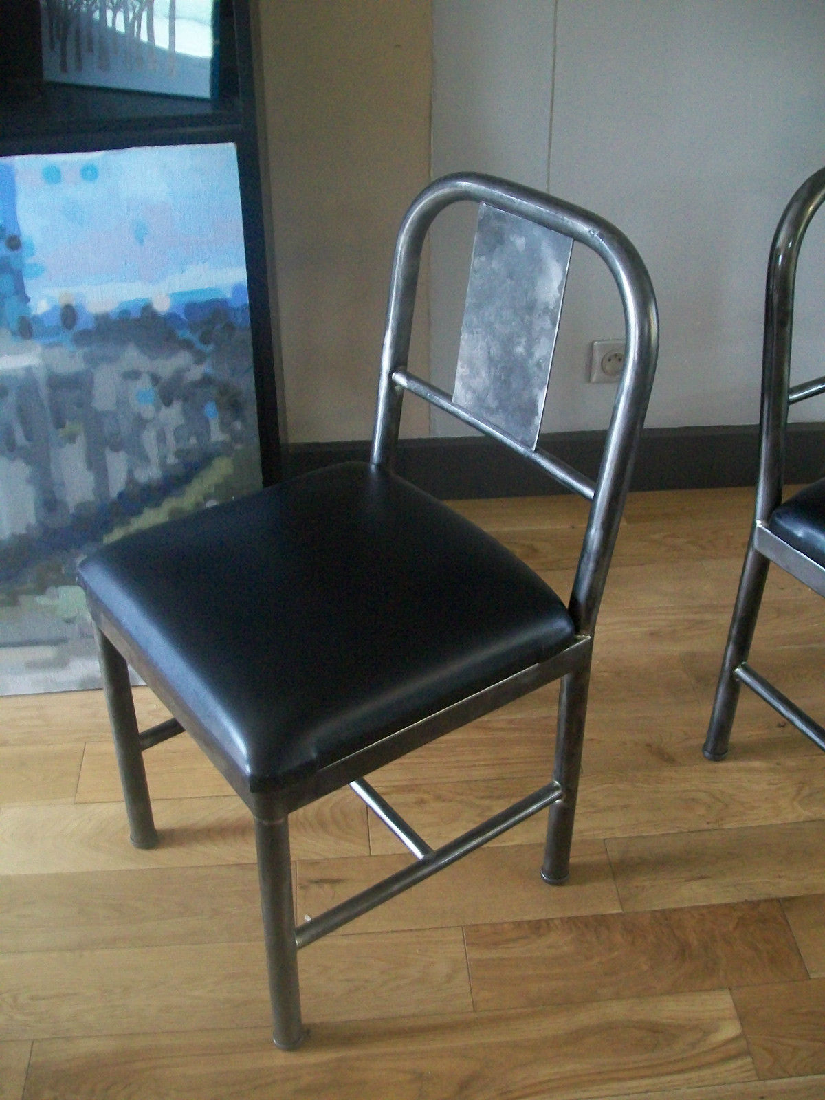 Pair of metal and industrial design leatherette chairs