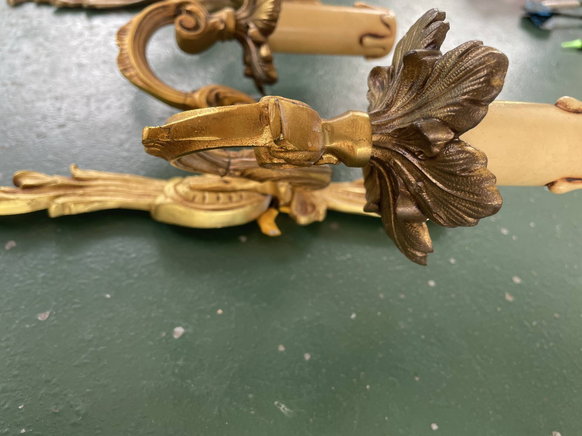 Pair of bronze Art Nouveau wall sconces.