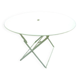 Old round folding metal table