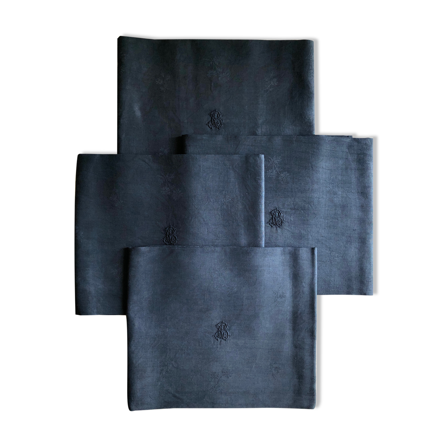 Lot four damasked and monogrammed towels linen and night blue silk