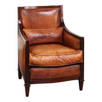 sheepskin Art Deco design armchair finished with wood