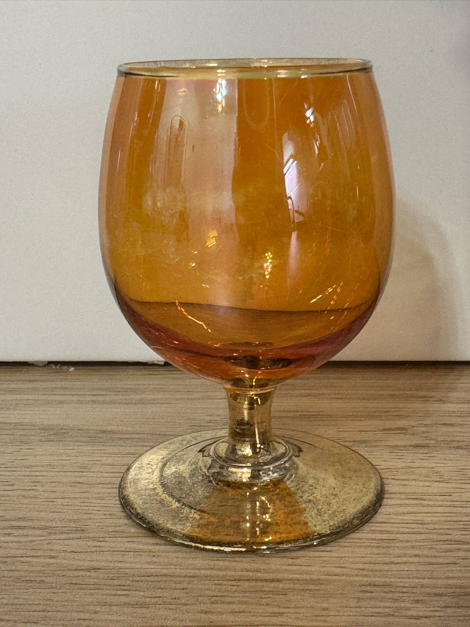 3 coloured smoked glass liqueur glasses with golden stems, vintage.