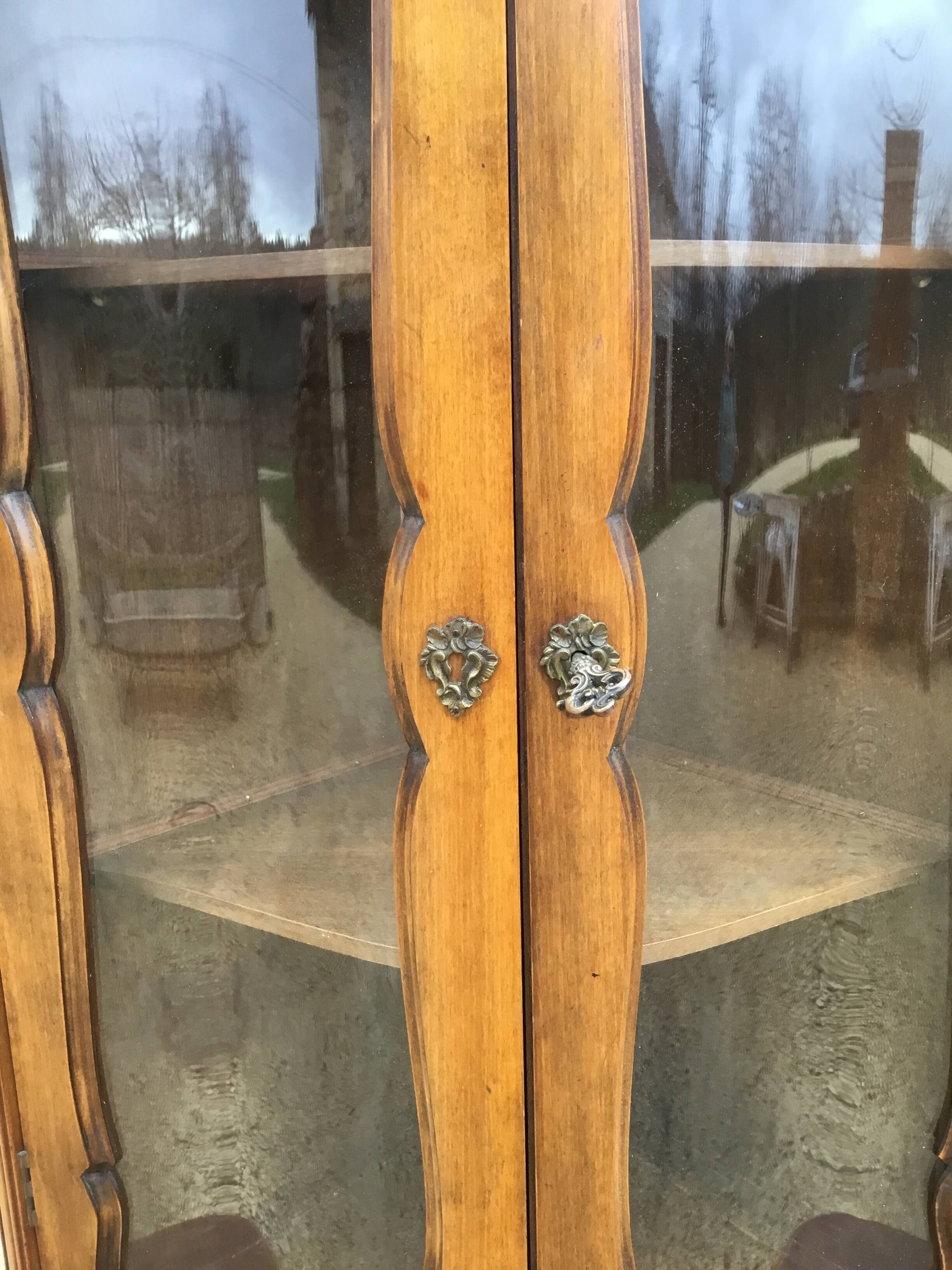 Glassed and curved corner mid-20th century