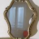 Small violin mirror in gilded resin