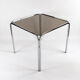 Table à manger avec cadre chromé et plateau en verre fumé des années 1970