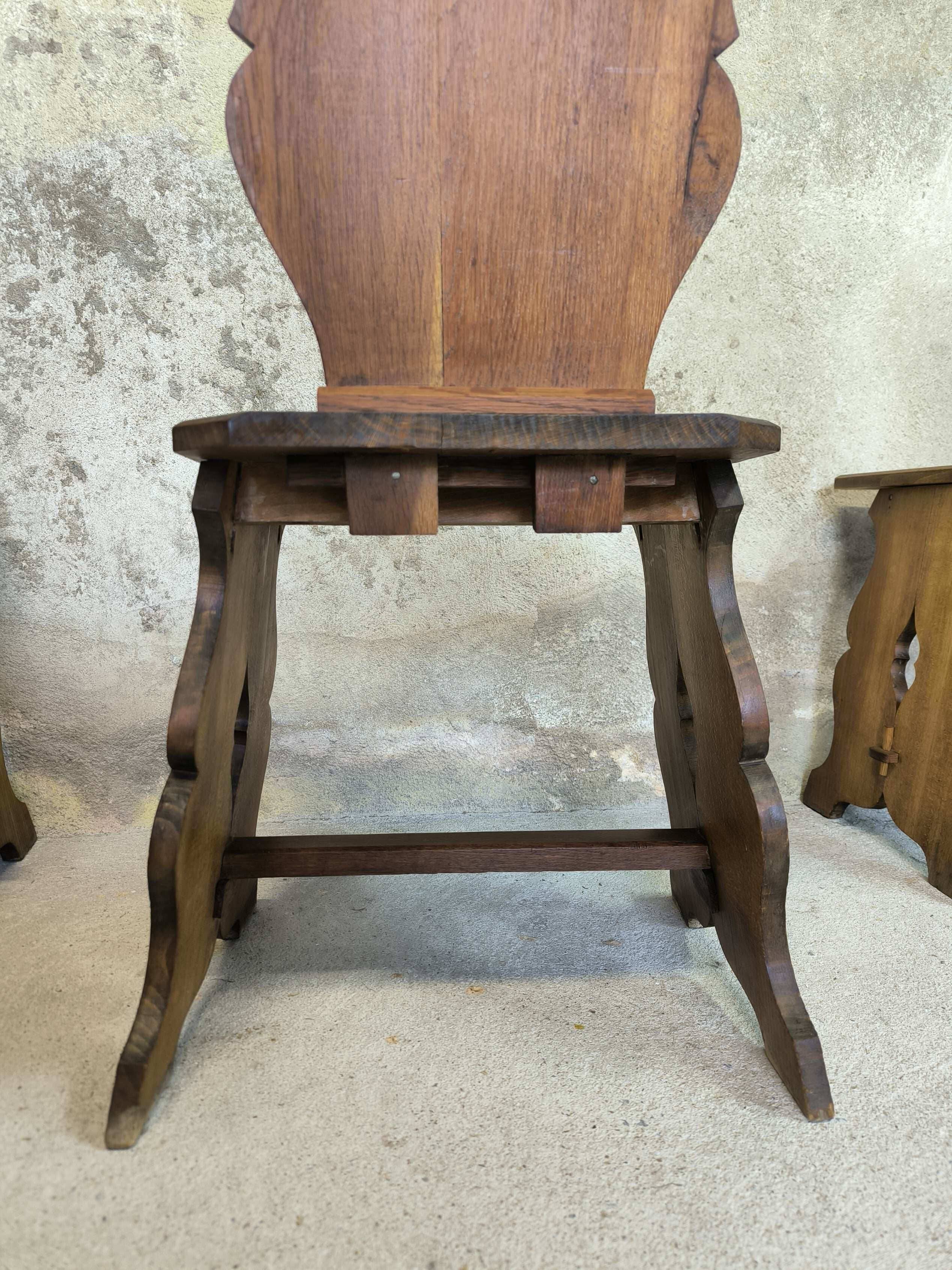 Set of six vintage brutalist wooden chairs.