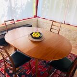 Expandable teak dining table, butterfly extension, circa 60s