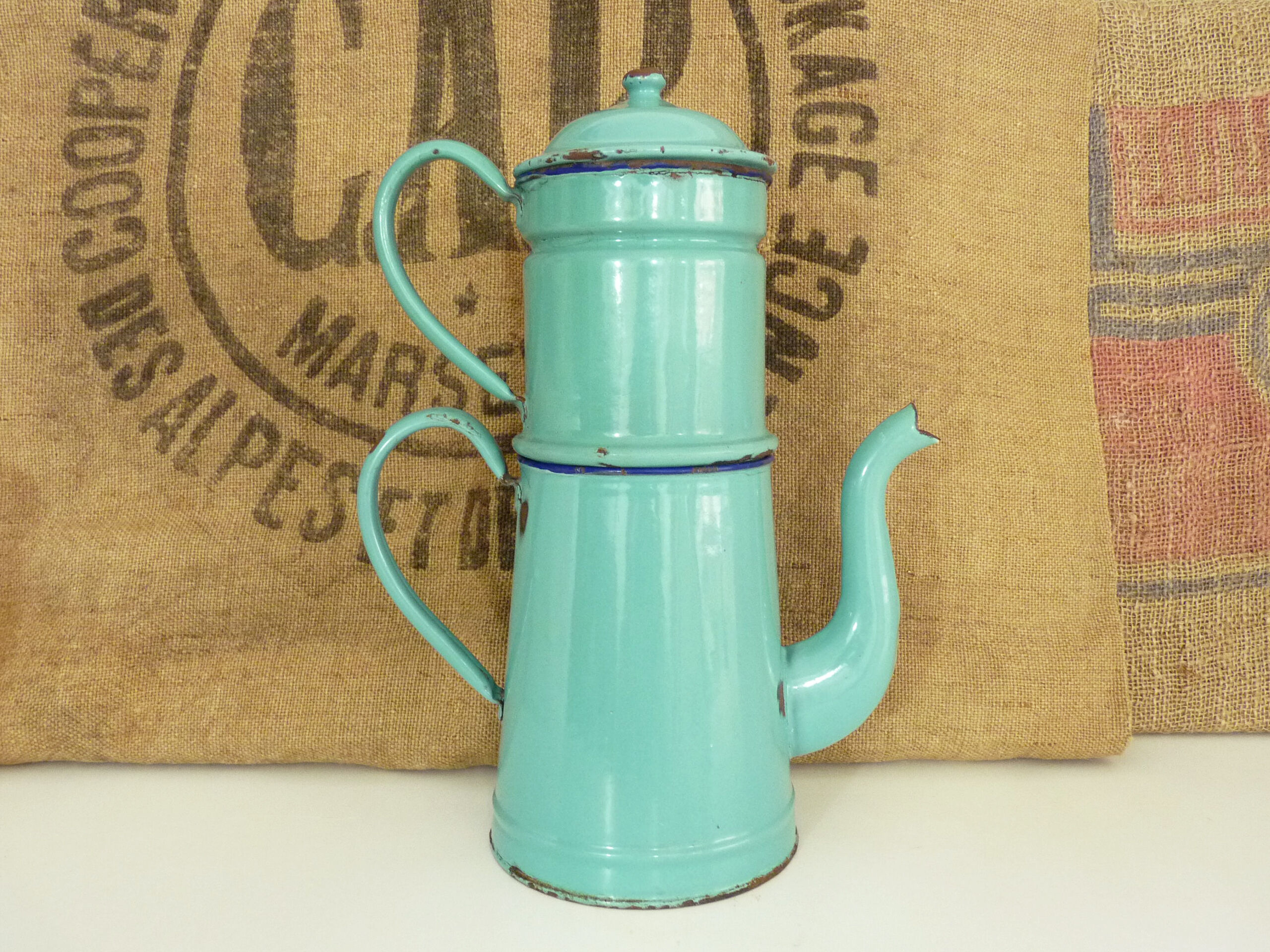 Old coffee maker in pastel blue enamelled sheet