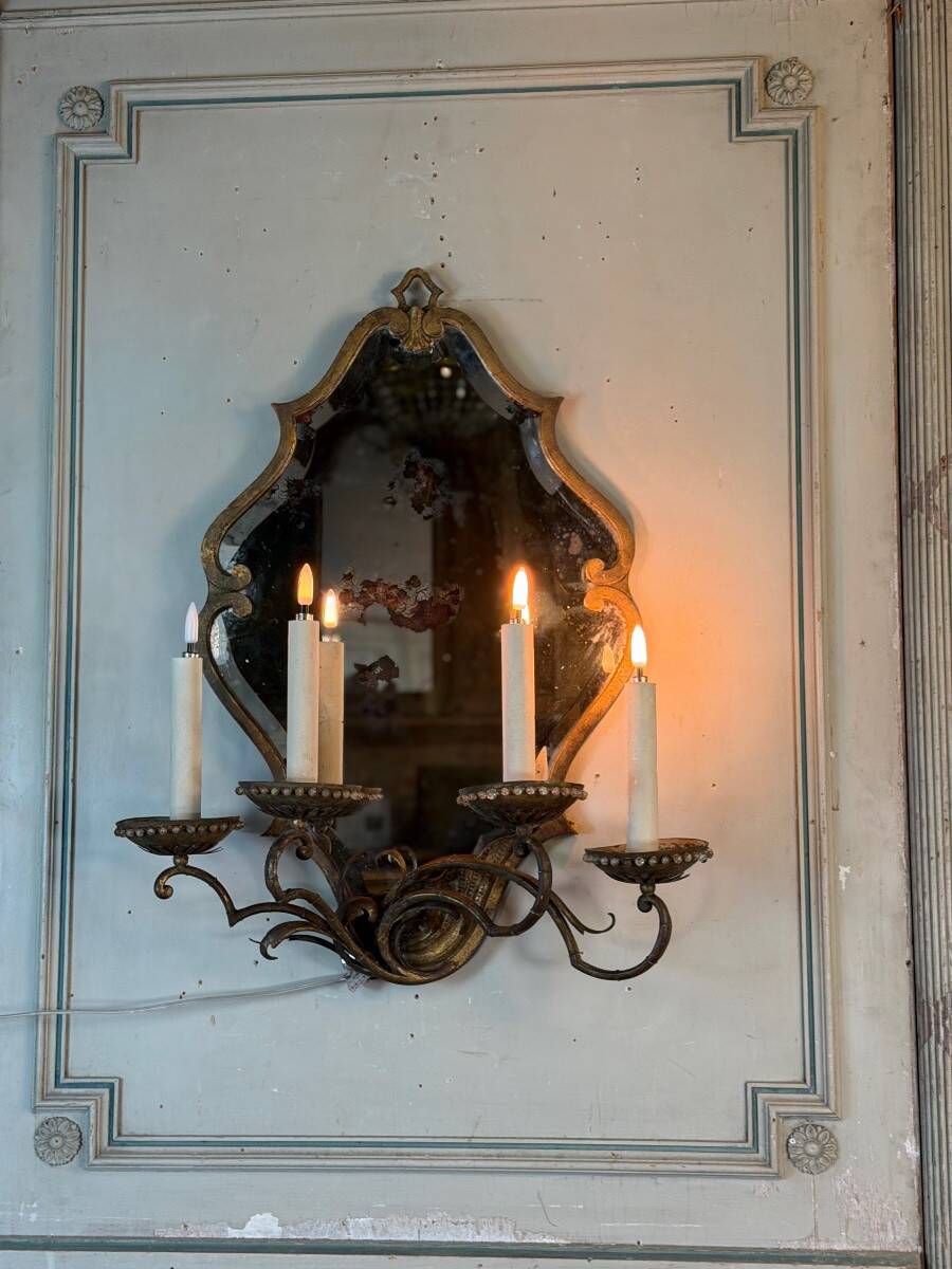 Gold metal wall mirror, in the style of Maison Baguès, Paris circa 1950.