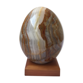 Large onyx stone egg on base