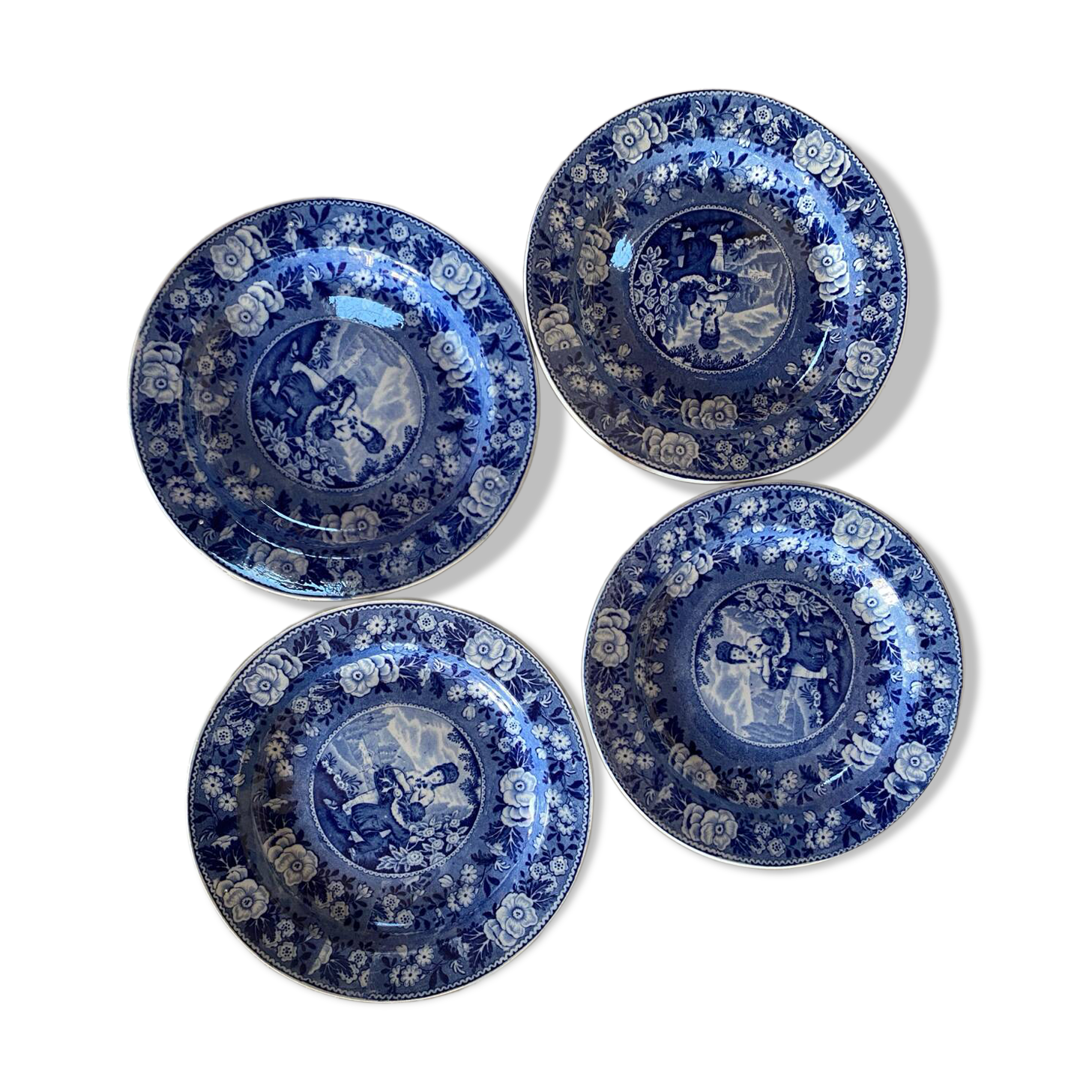 Set of 4 English flat plates from the mid-19th century.