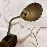 Articulated shell wall light