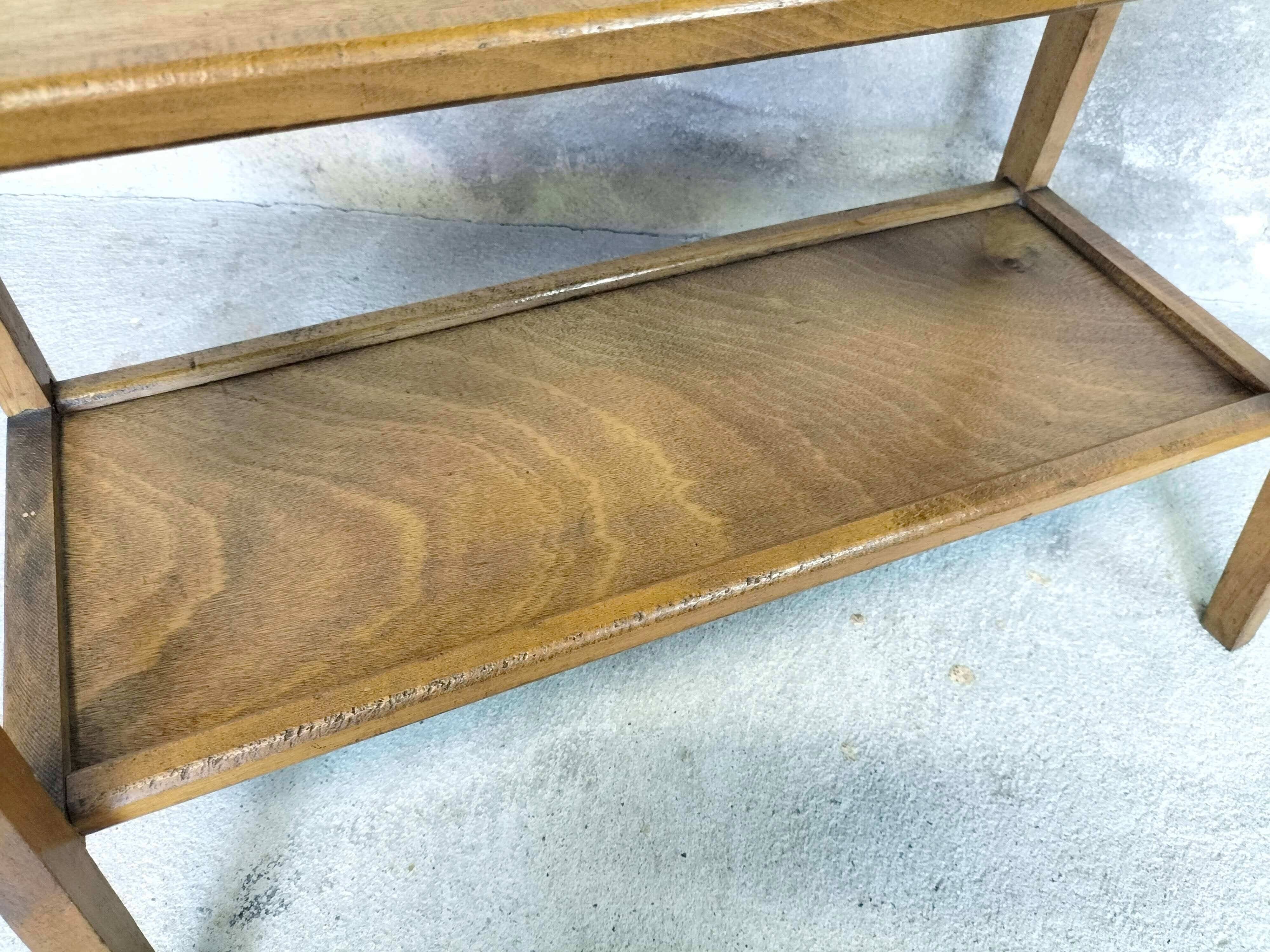 Vintage shelf on wooden legs in wood