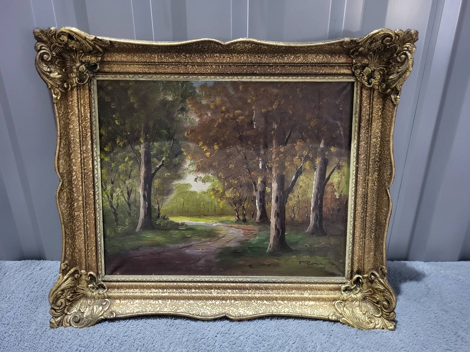 Signed oil painting on gilded wooden frame