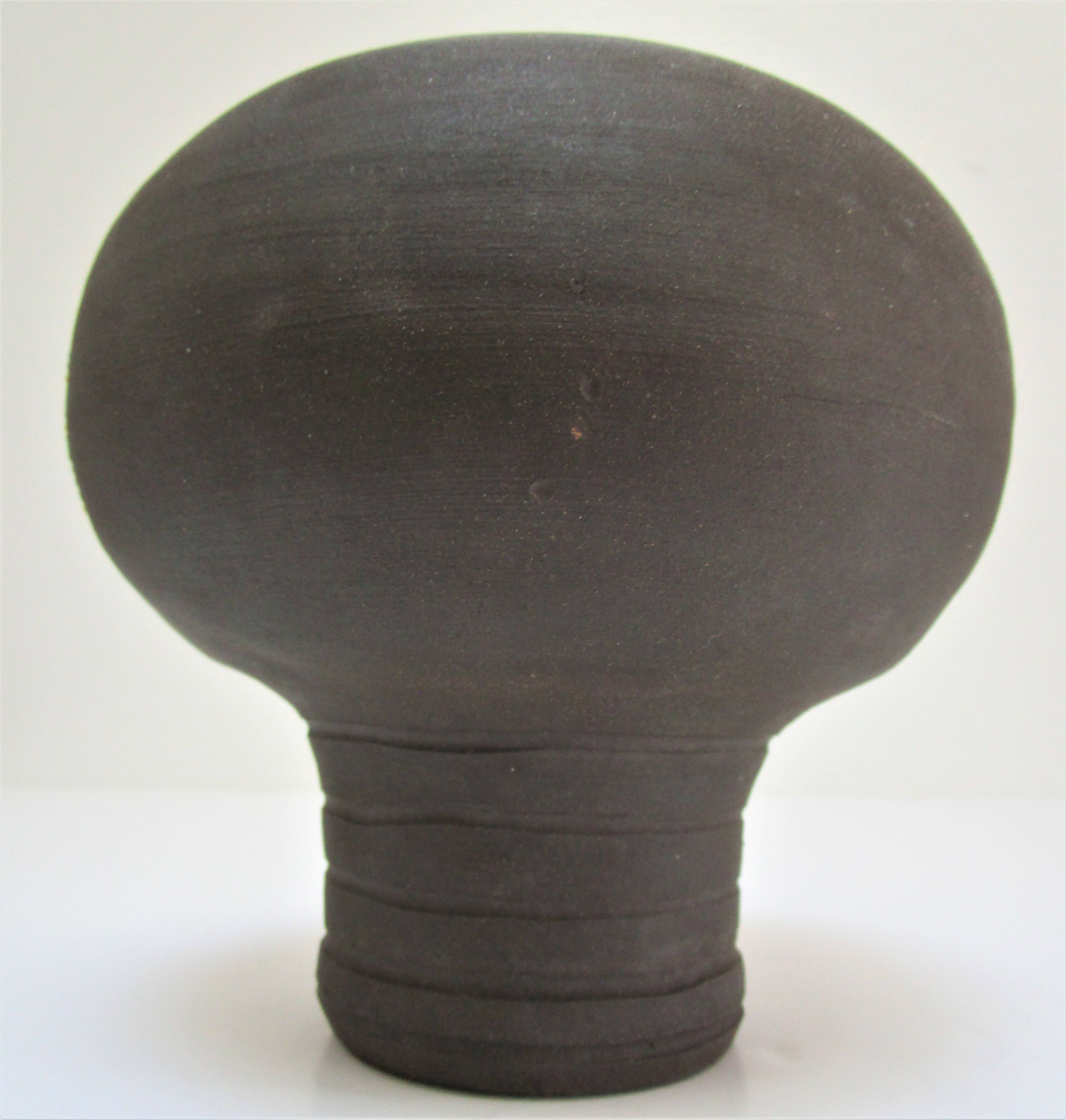 Anthropomorphic candle holder, scarified ceramic, stamped design