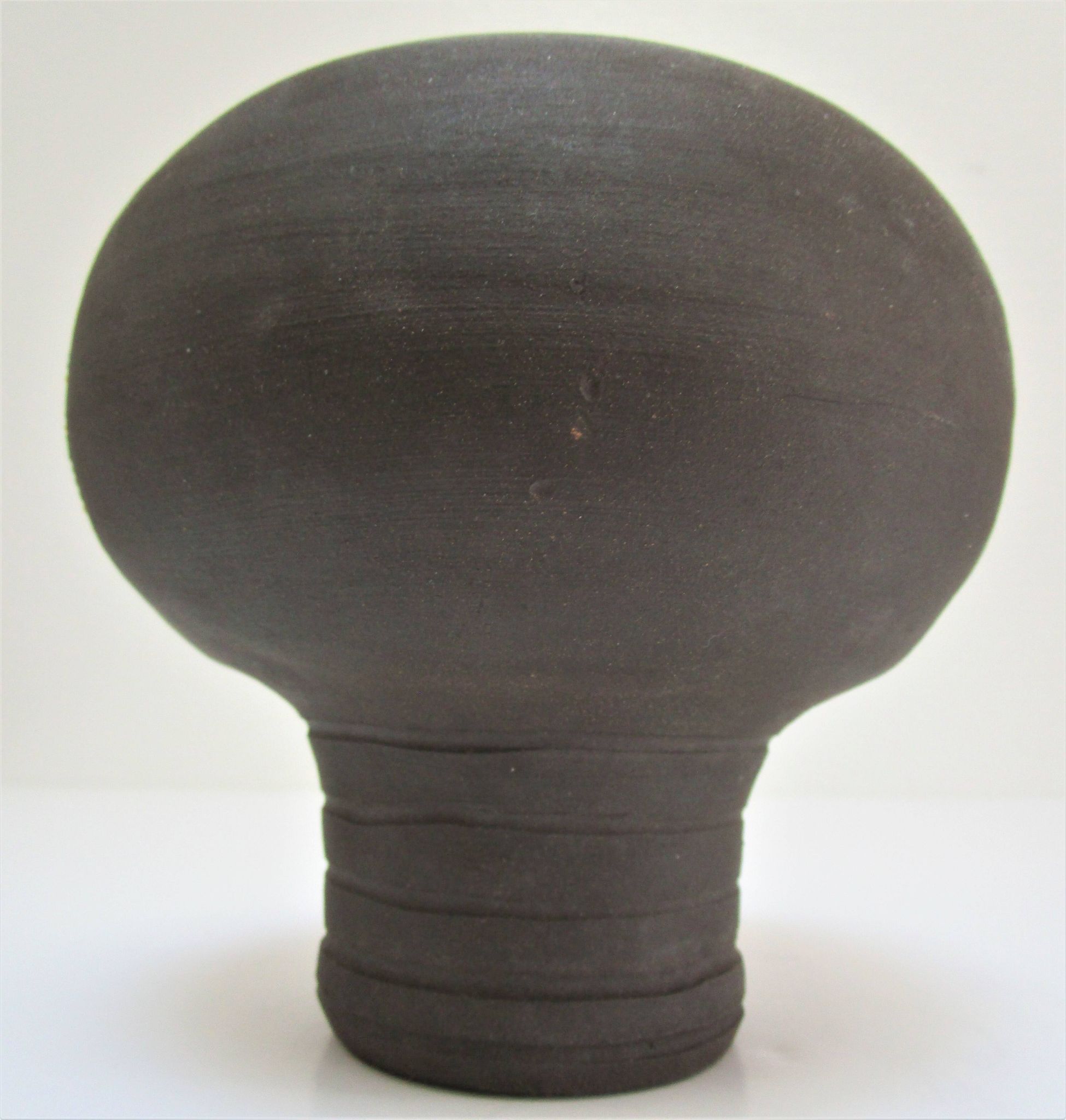 Anthropomorphic candle holder, scarified ceramic, stamped design