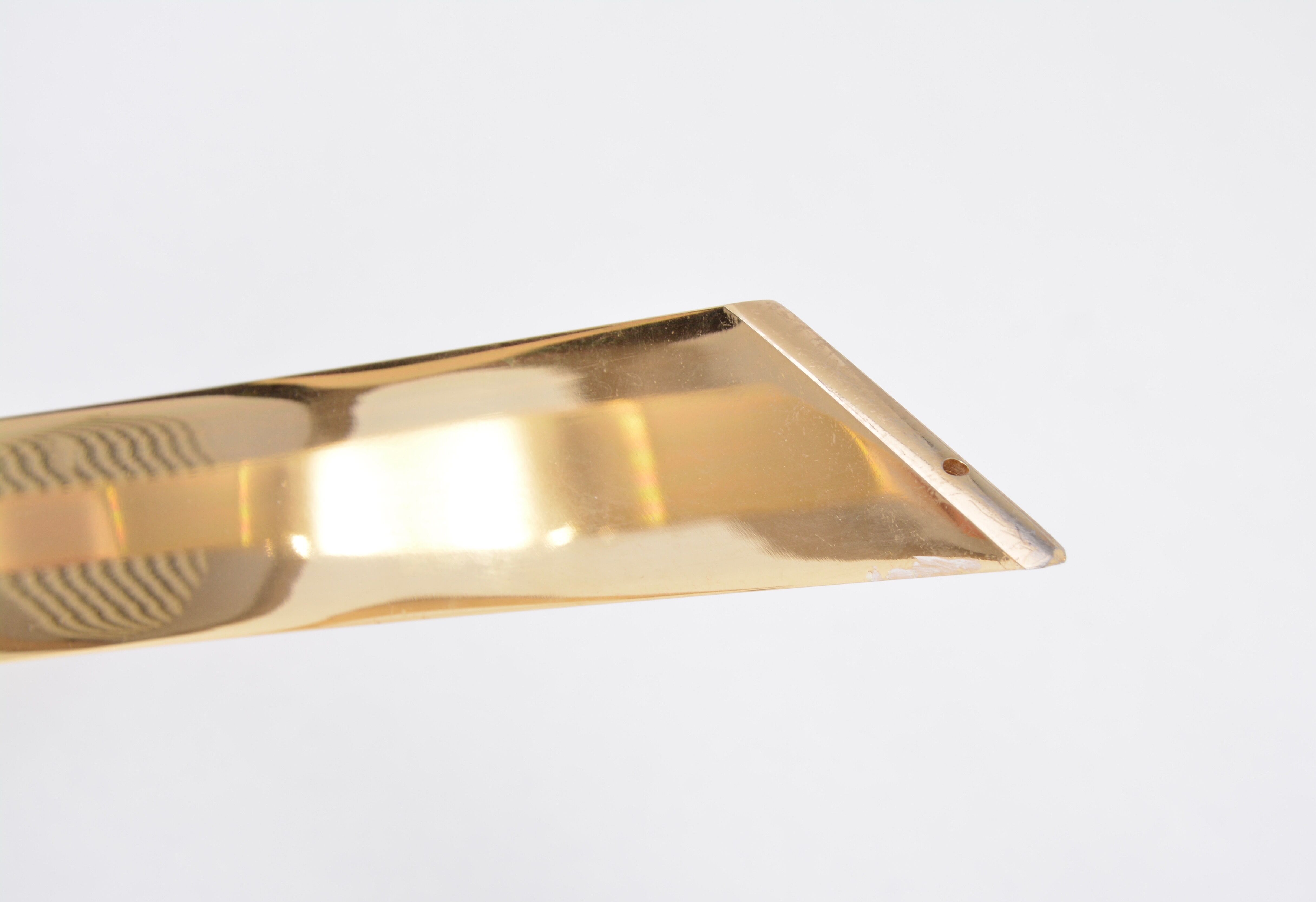 Gold Colored Mid-Century Modern coffee table with smoked Glass top