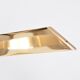 Gold Colored Mid-Century Modern coffee table with smoked Glass top