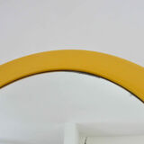 Round wall mounted mirror in yellow plastic 1970