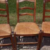 17 old straw chairs