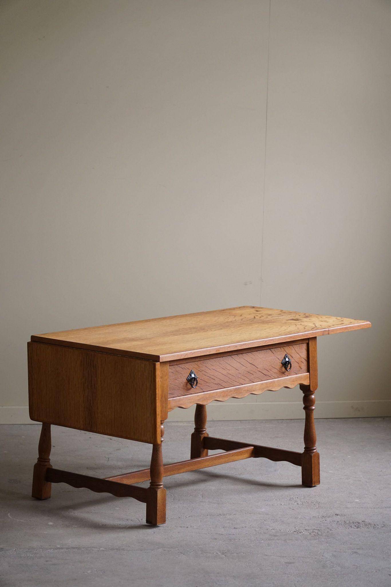 Danish folding table from the mid-century with a drawer in oak, Henning Kjærnulf, 1960s.