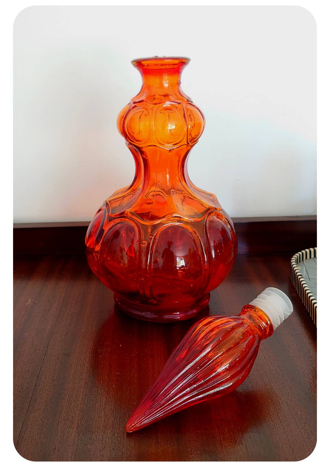Amber orange corset empoli bottle with stopper