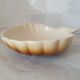 Brown and white ceramic shell bowl