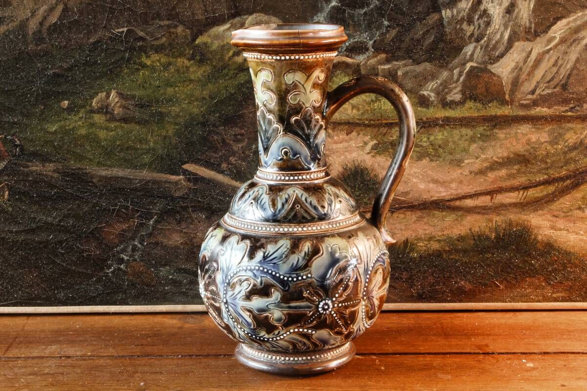 Doulton Lambeth stoneware jug (1879), floral decoration by Henry Winstanley.