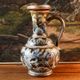 Doulton Lambeth stoneware jug (1879), floral decoration by Henry Winstanley.