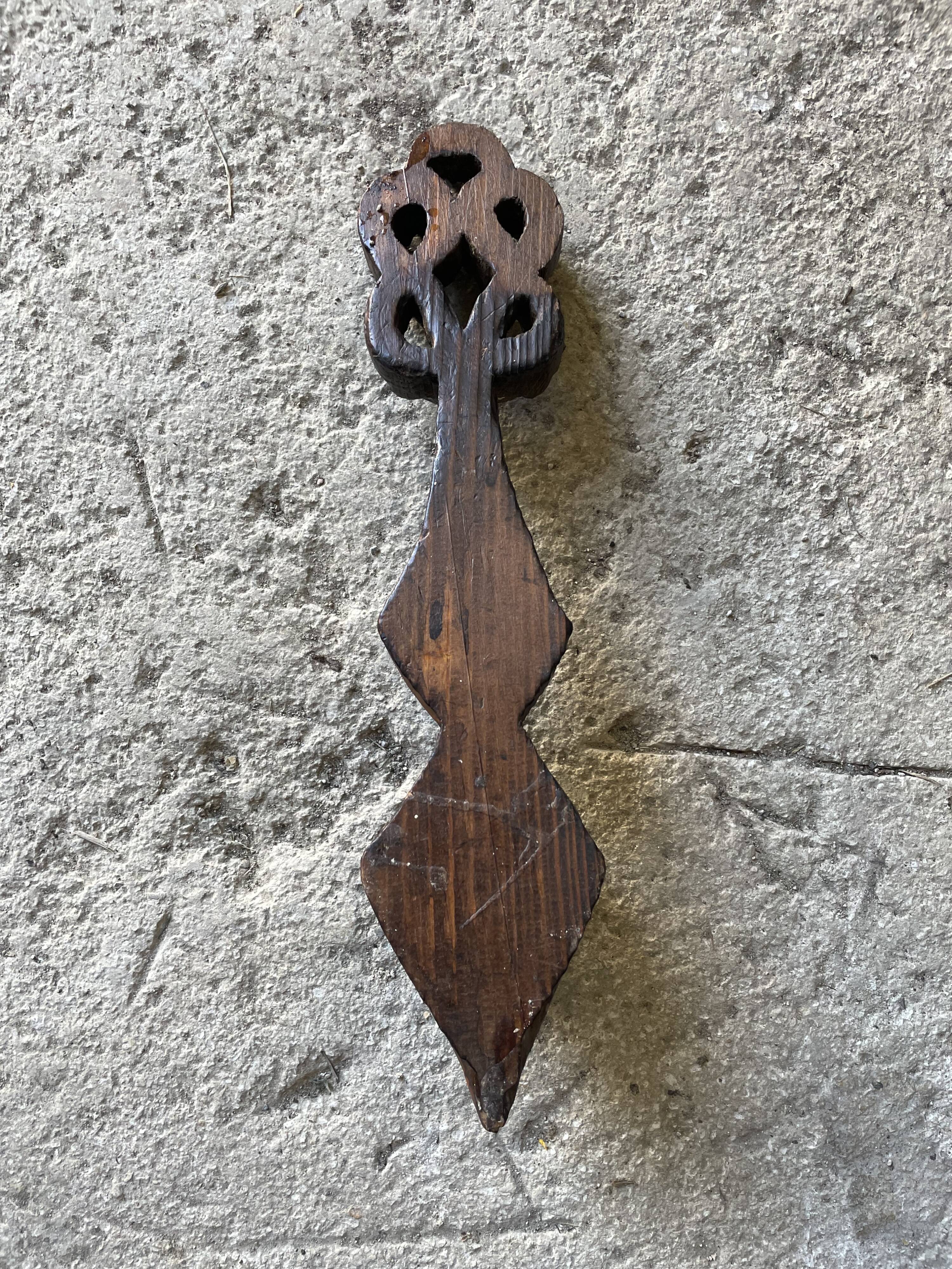 Carved wooden wall candle holder