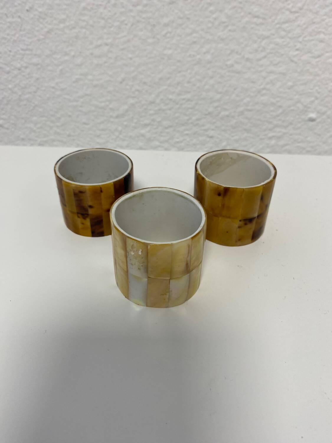 3 mother-of-pearl napkin rings