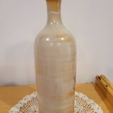 Bouteille fleurie en grès émaillé