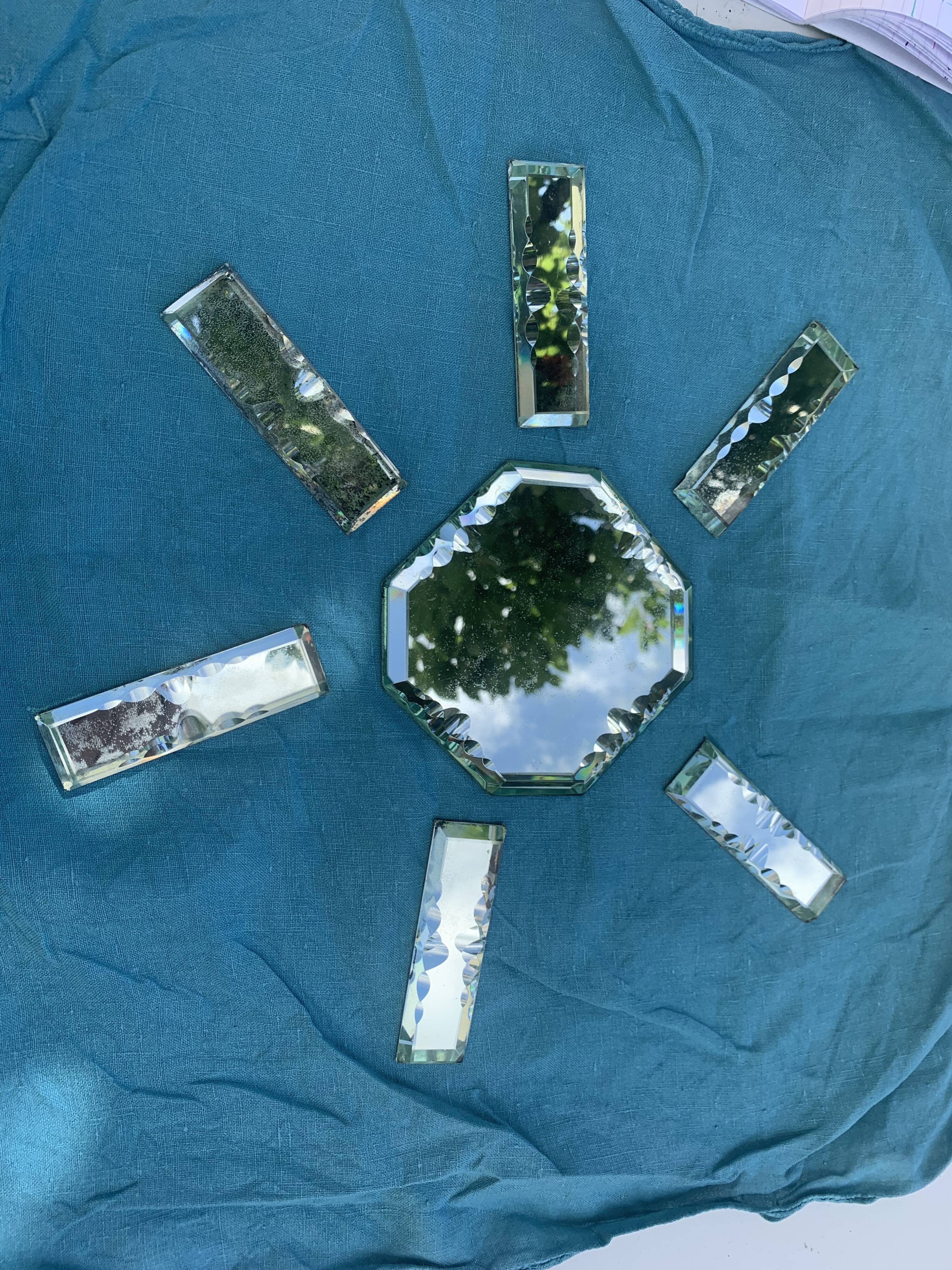 6 knife holders and a bottle bottom, glass, beveled mirror