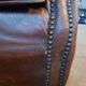 Old studded leather club chair 1930-1930