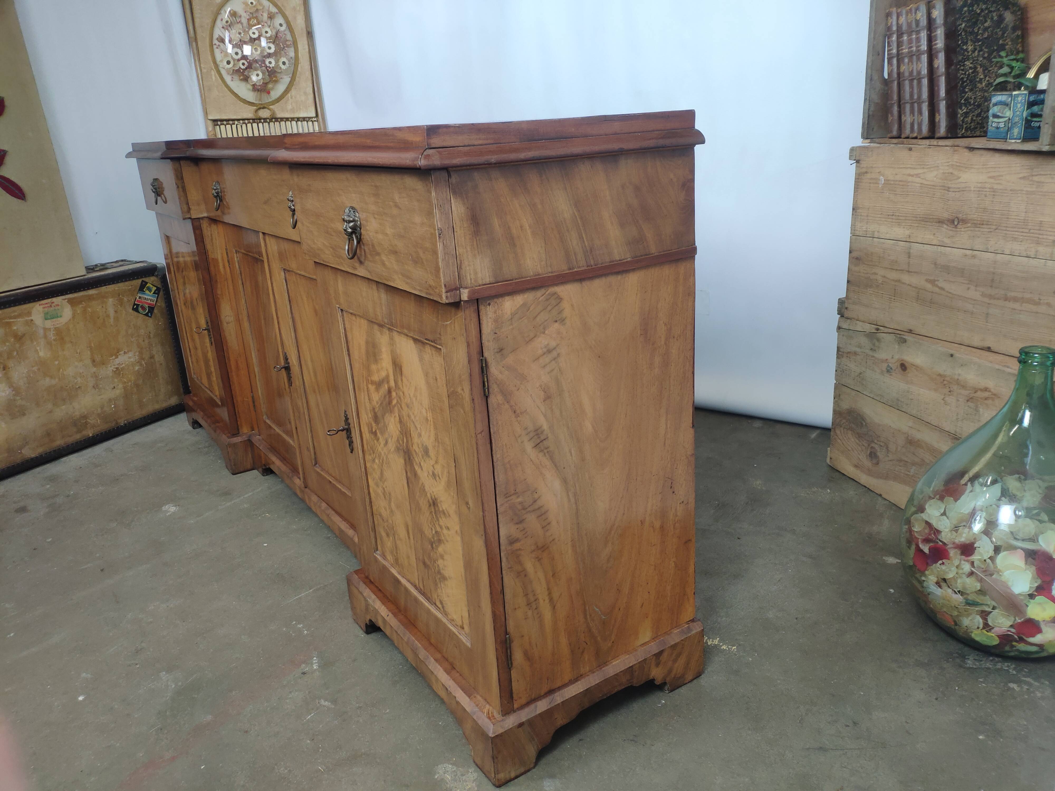 Walnut 4-door lion head sideboard