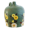 Old terracotta jug painted green