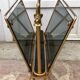 Revised door in brass and smoked glass