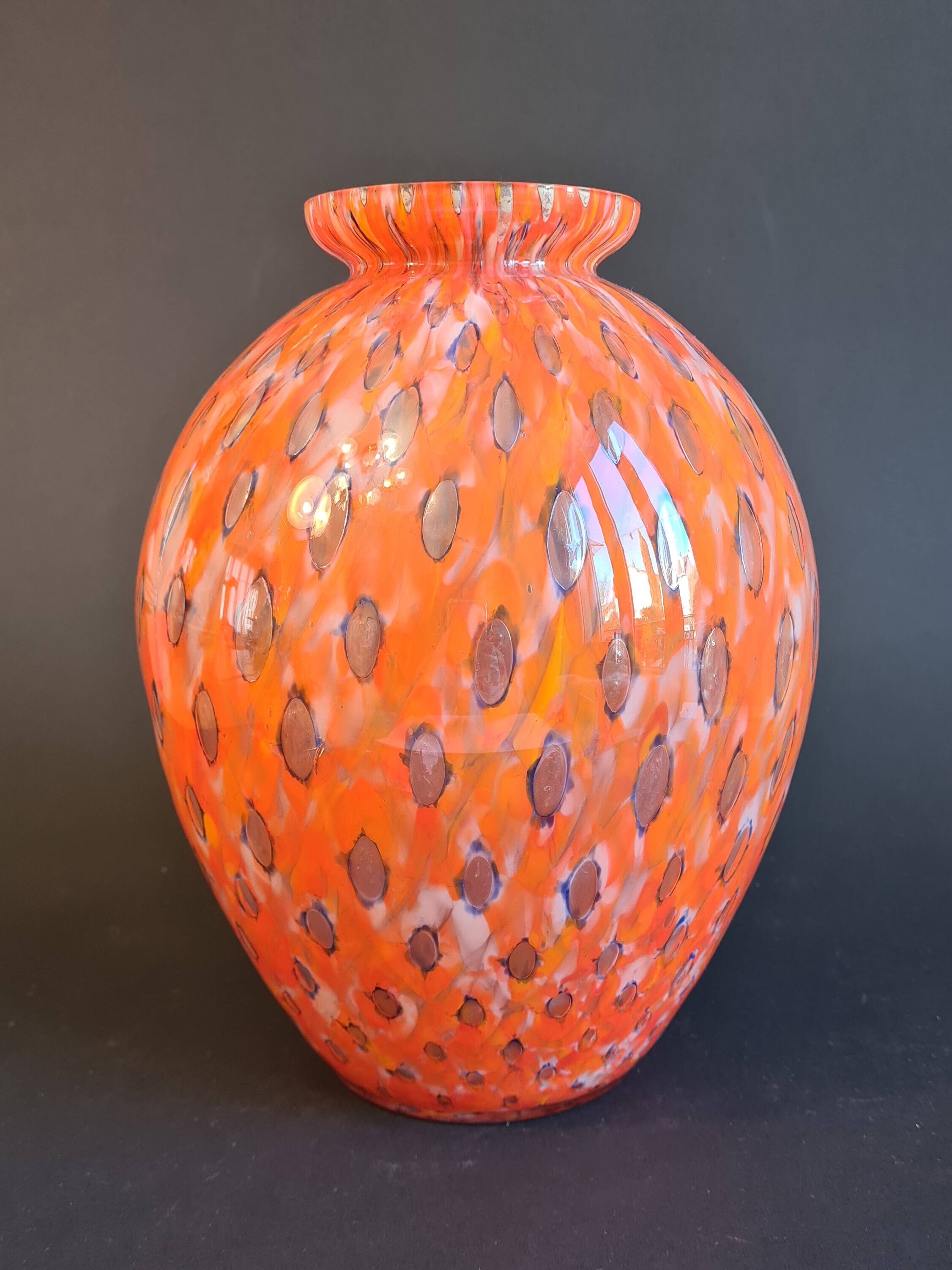 Shimmering orange blown glass vase