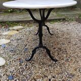 Bistro table in marble and cast iron