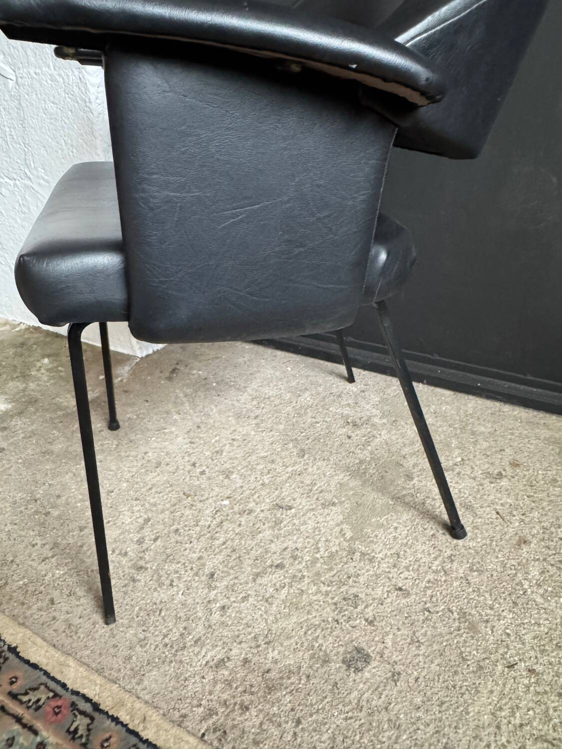 Black armchair from the 1950s