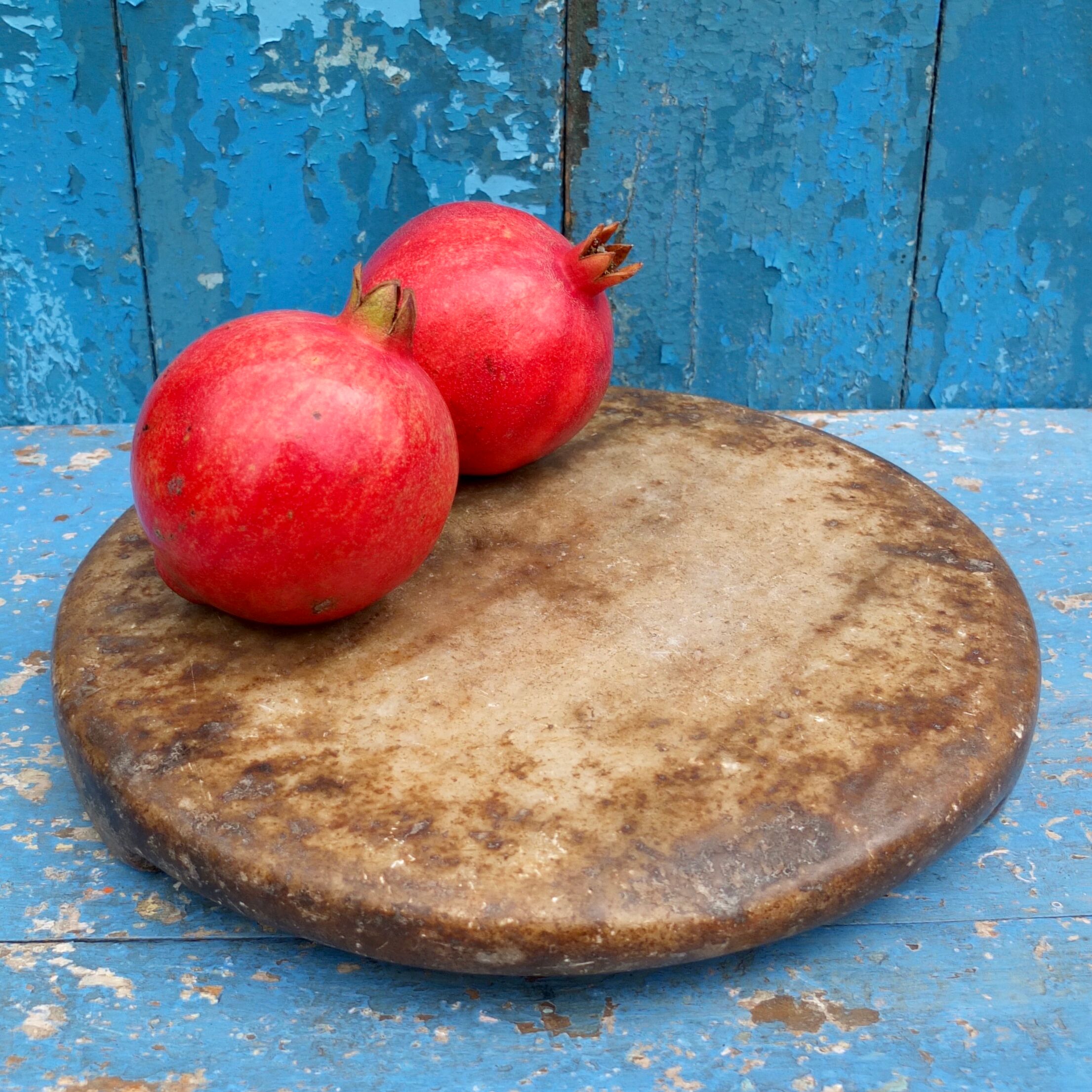 Antique round marble bread board