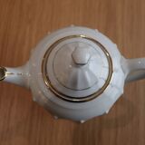 Coffee and tea service in Limoges porcelain with anemone flower pattern and gilding.