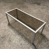 Set of coffee tables, pedestal tables and nesting tables in smoked glass and metal