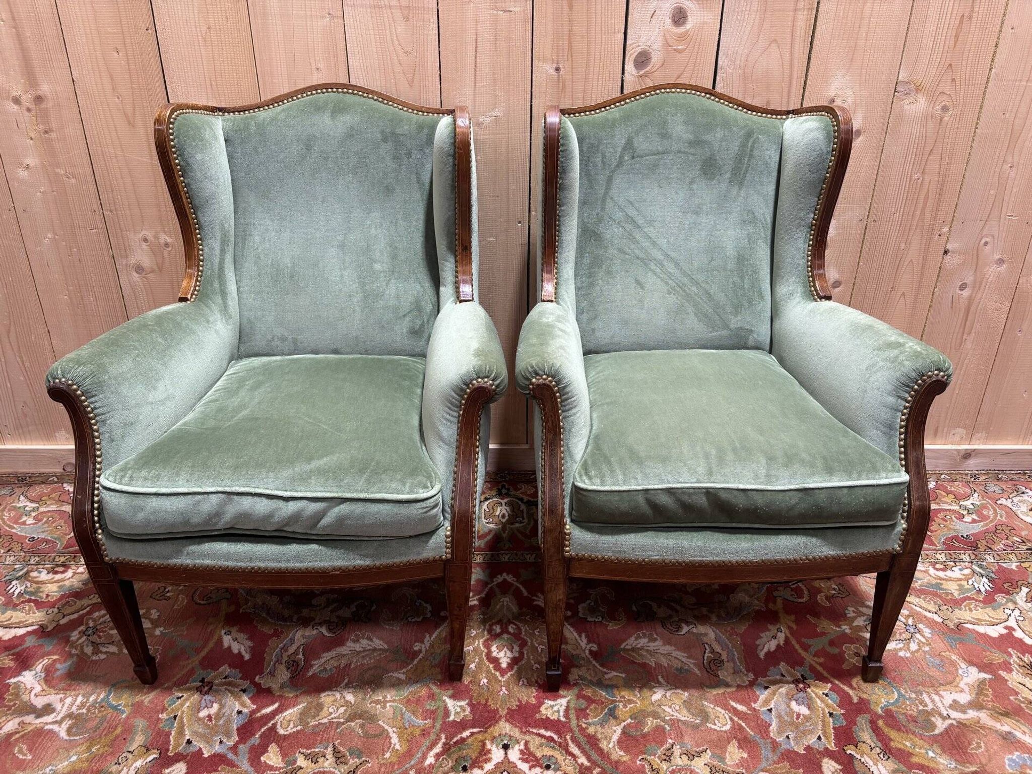 Pair of Louis XVI style wingback armchairs