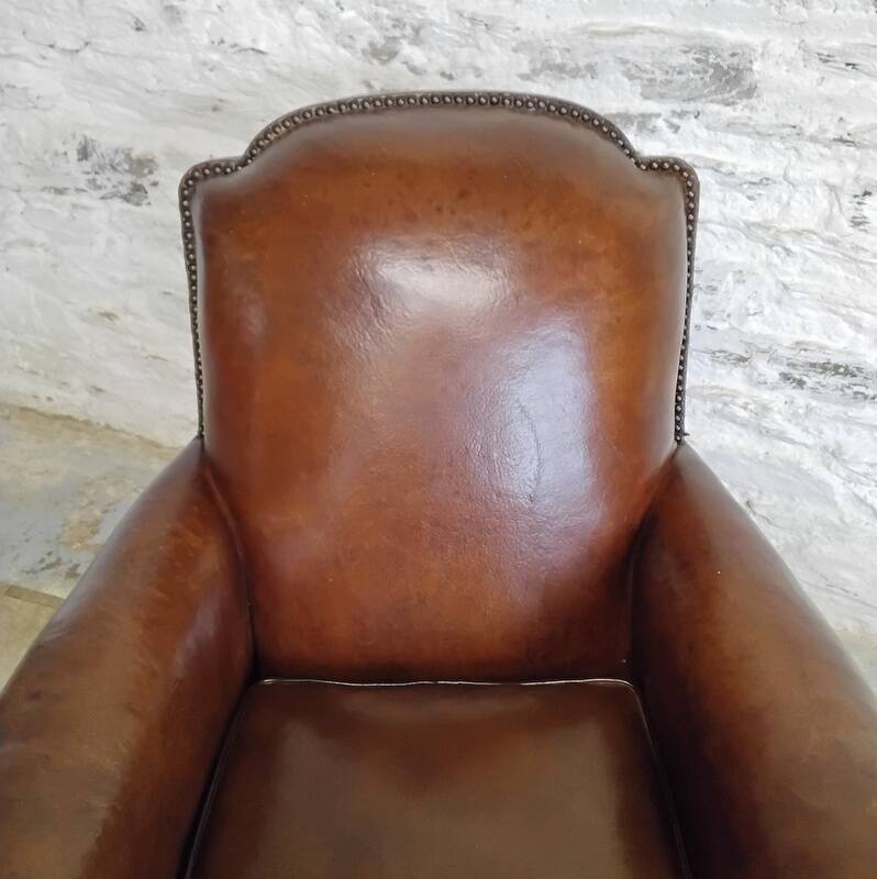 Studded club armchair