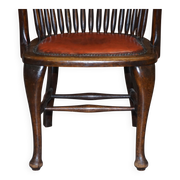 Antique English Edwardian captain's chair in oak by Ralph Johnson.