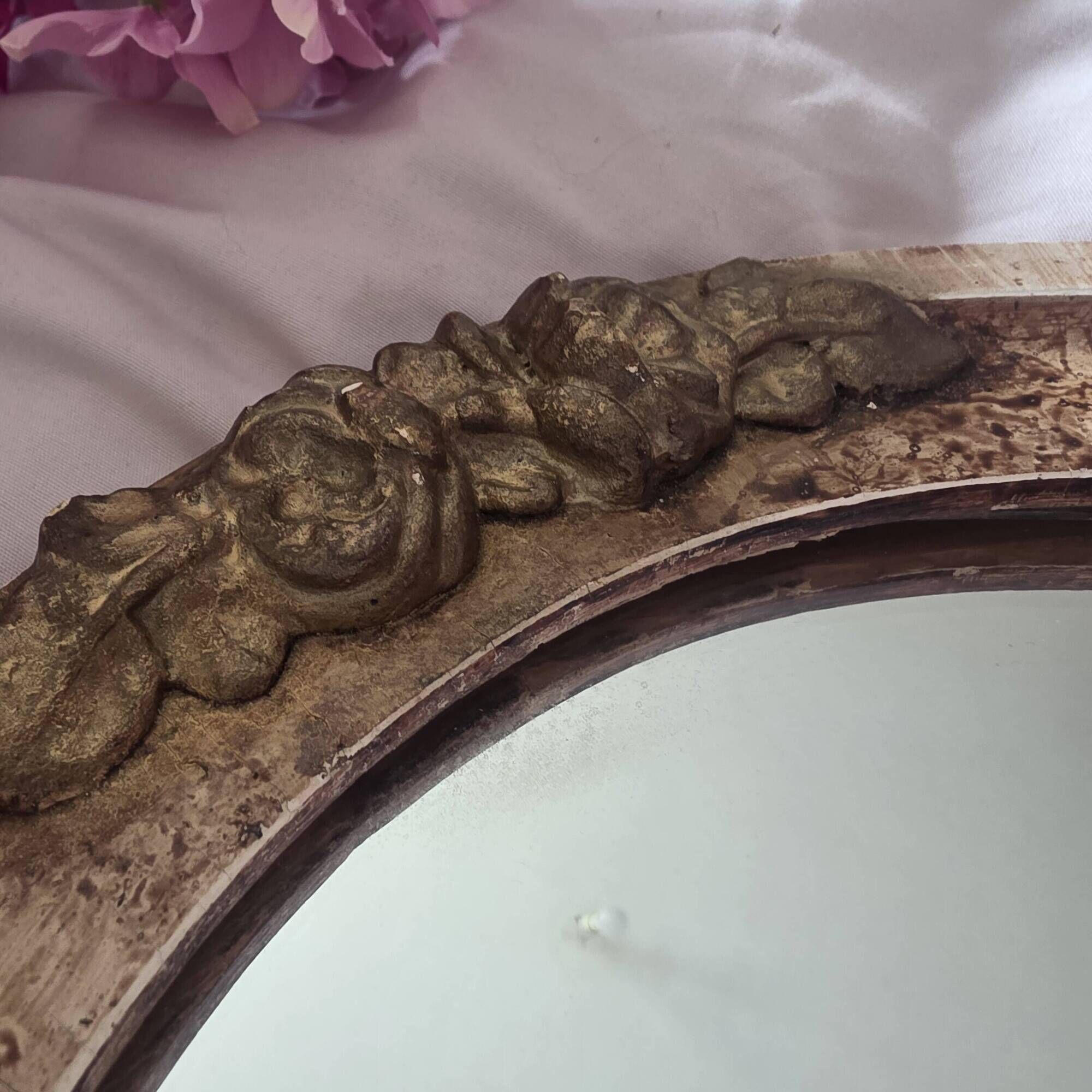 paire de miroirs ovales anciens