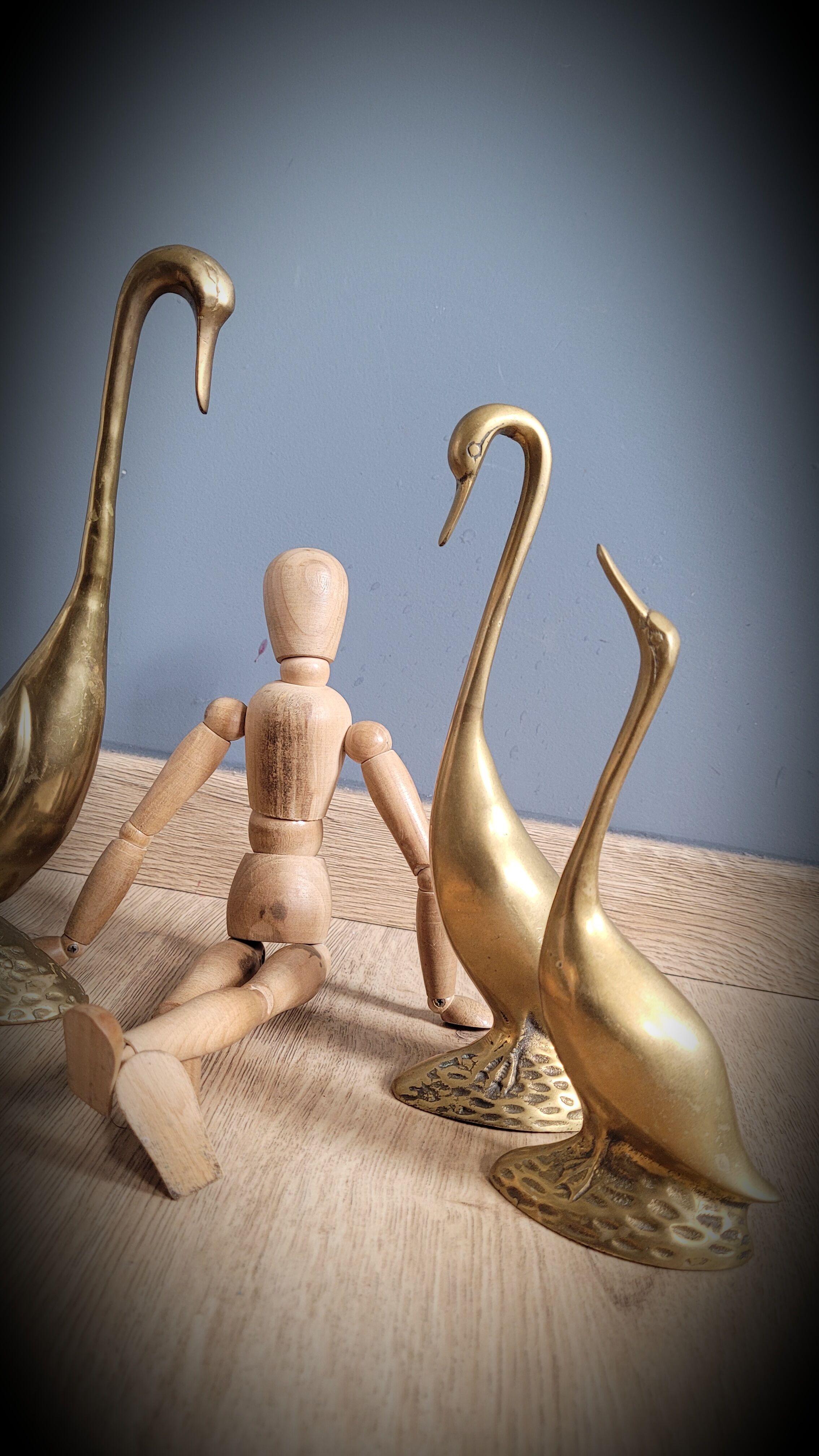 Trio of brass geese