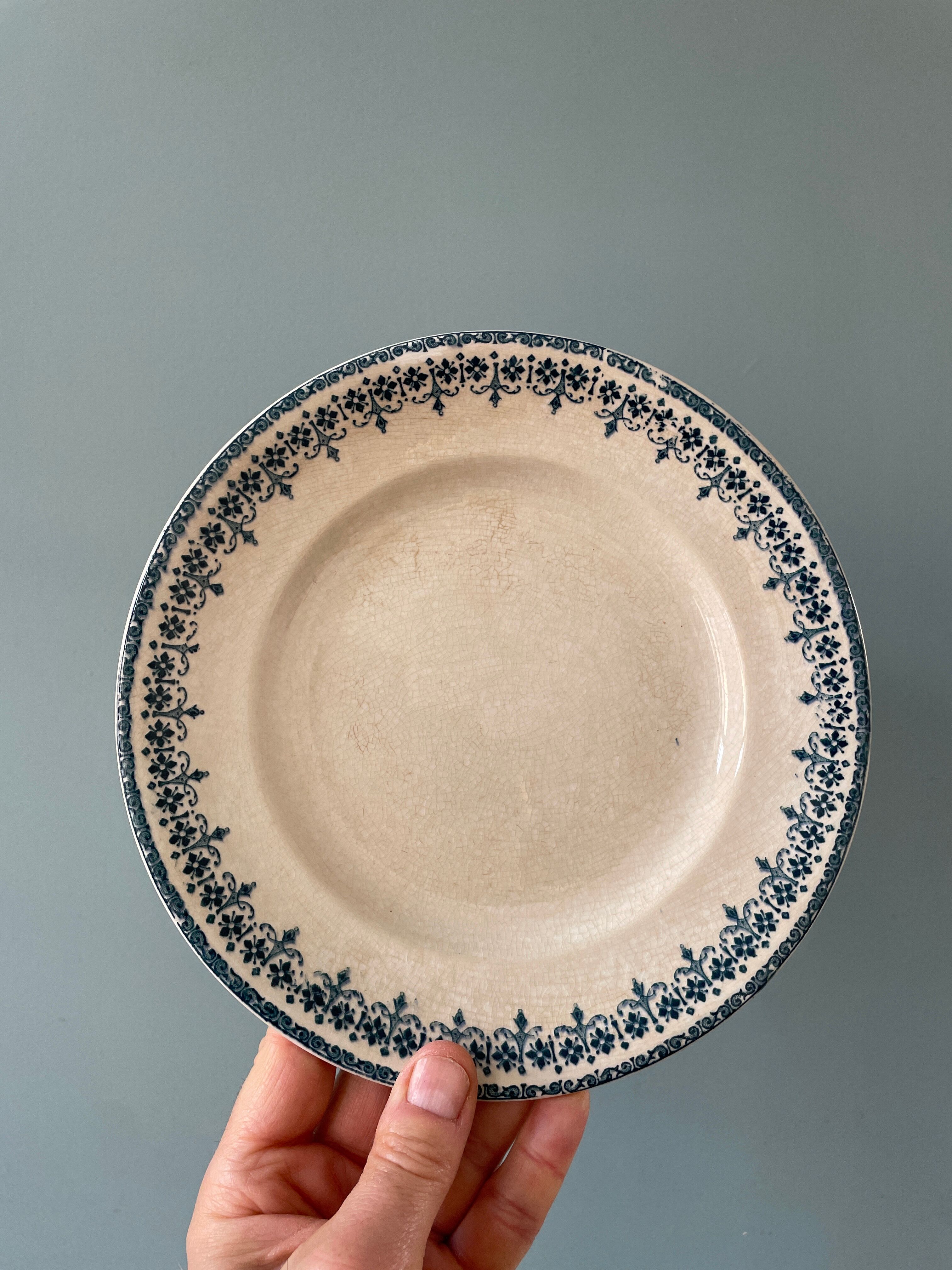 Series of 12 mismatched Terre de Fer dessert plates