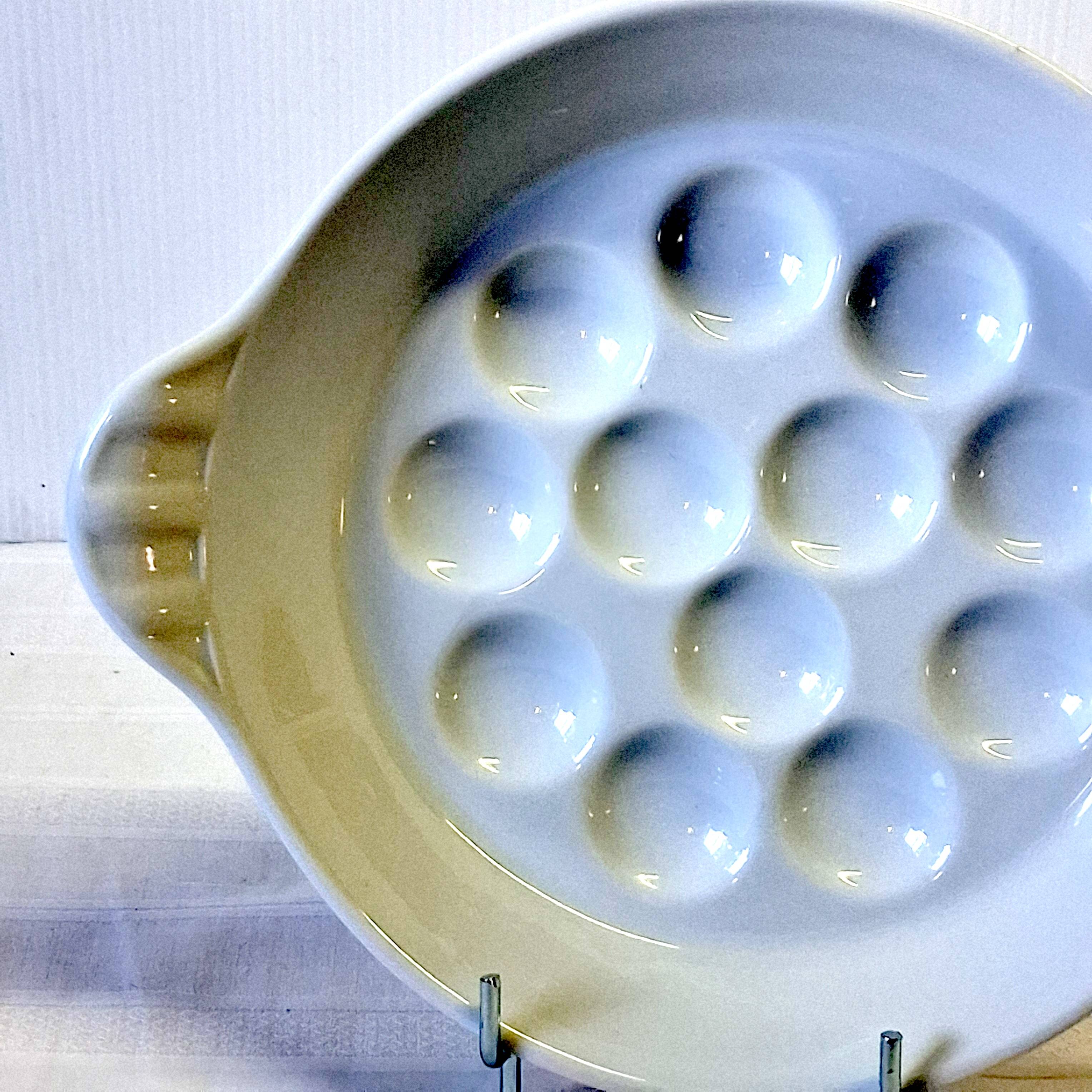 White Reussy porcelain snail dish in very good condition.
